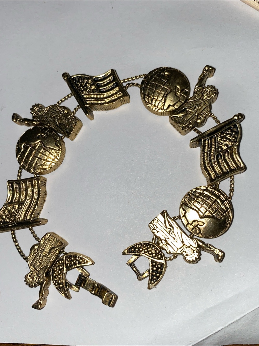 Vintage Gold tone 1995 BG TOFA slide globe flag statue of liberty bracelet